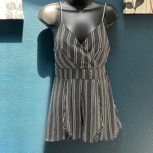 Medium black & white striped relaxed romper